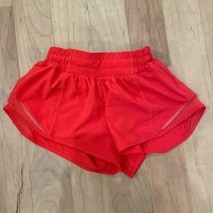 Lululemon carnation red Hotty Hot shorts, size 0